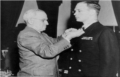 President Truman placing Congressional Medal of Honor